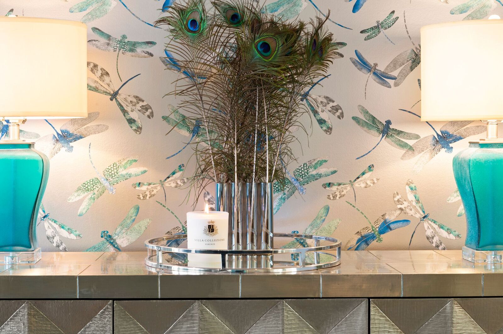 Fun and unique dining room decor peacock feathers and dragonfly wallpaper designed by rachel boden interiors Australia