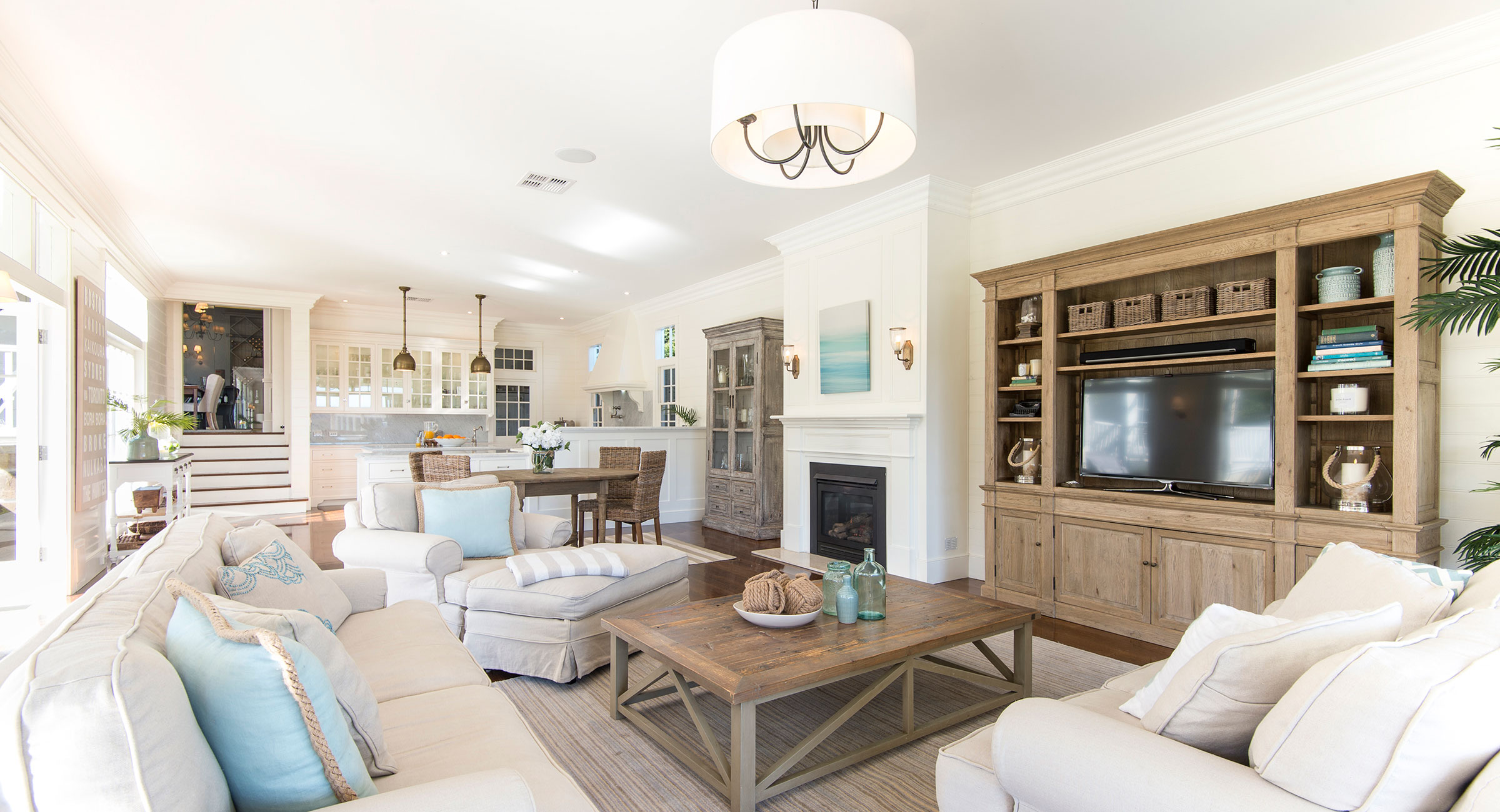 Hamptons style kitchen and family room designed by Rachel Boden Interiors Neutral colour scheme